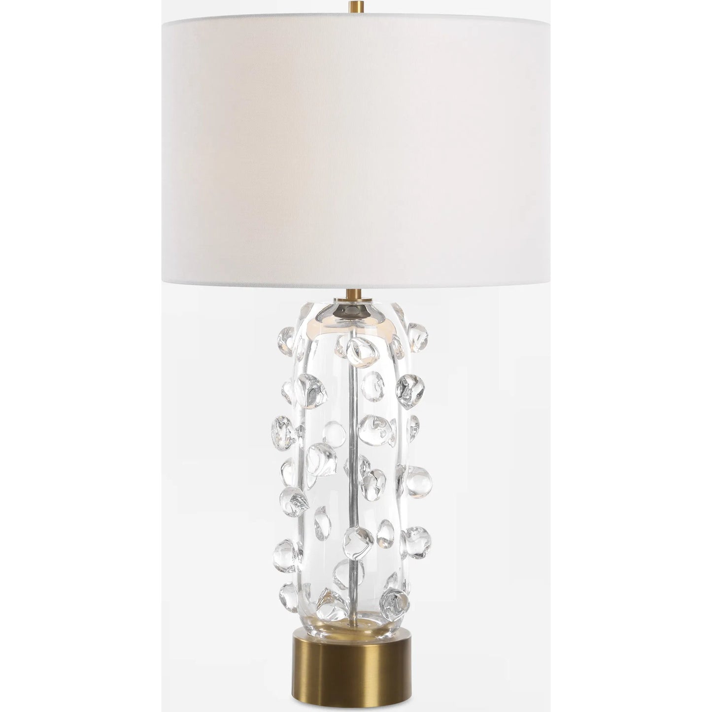 000 SI-2295251 | Primary Silo | Aura Clear Glass Table Lamp by Uttermost in brass. Made from glass, iron, fabric in a modern style.