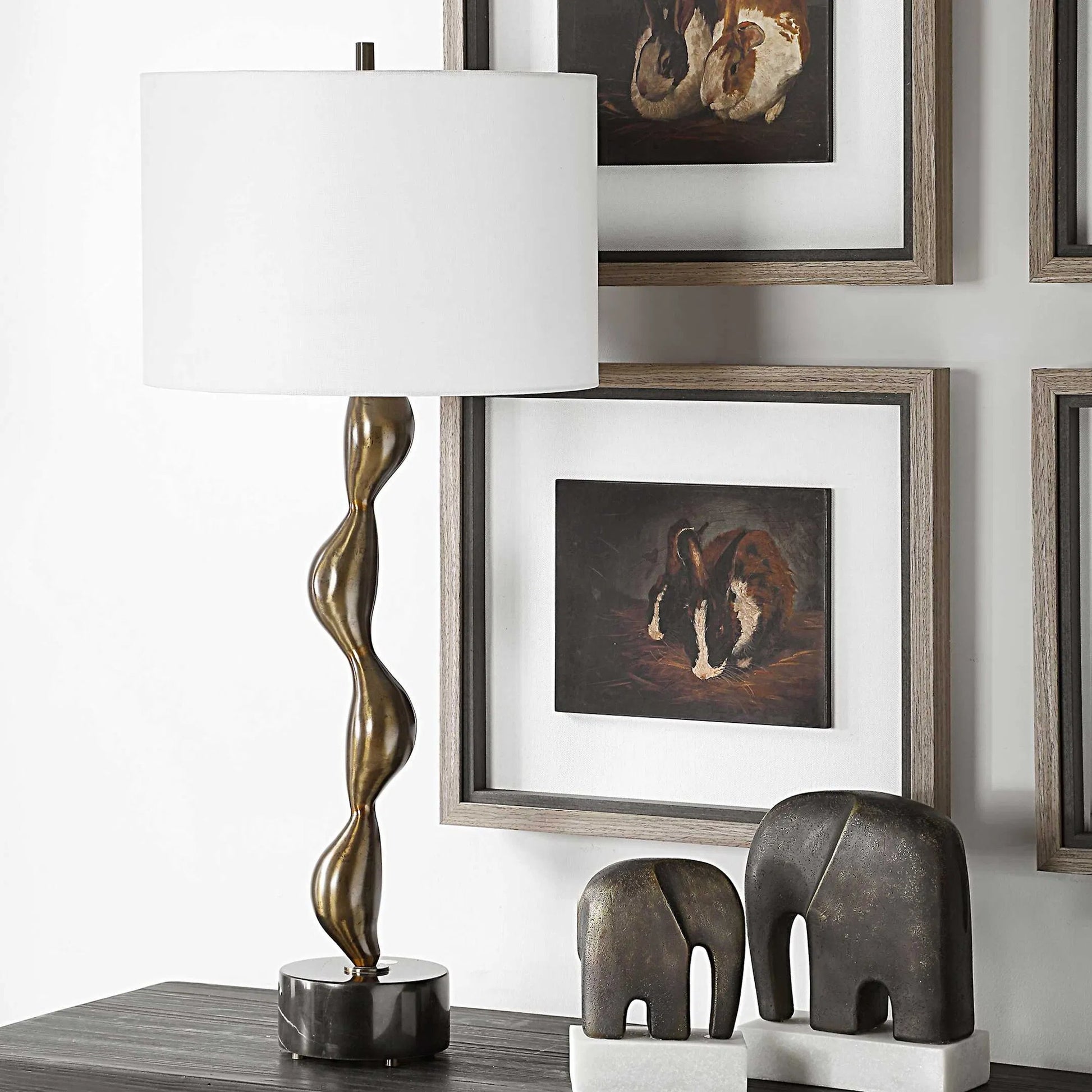 Remolino Table Lamp by Uttermost in bronze. Made from marble, iron, fabric in a unique style.