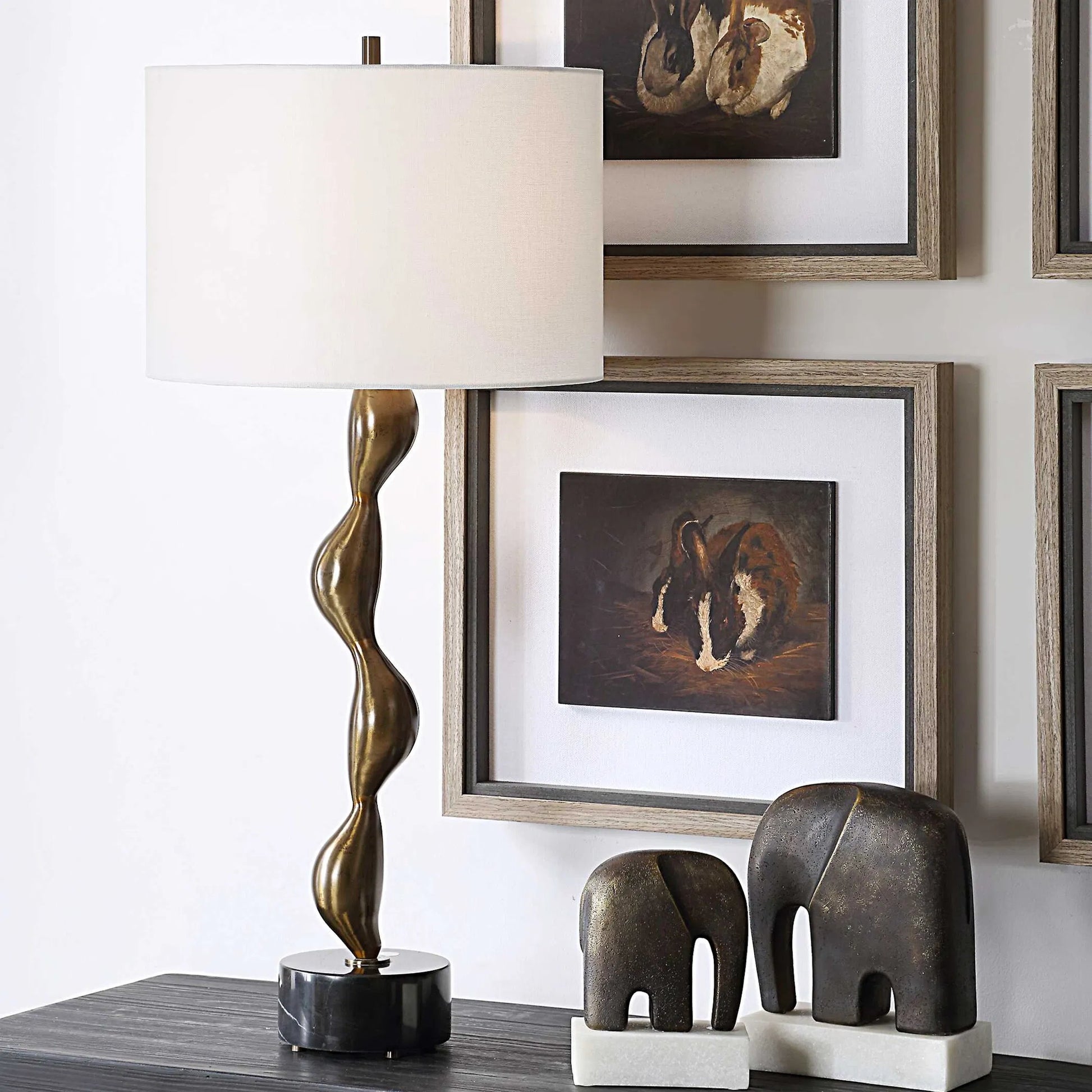 Remolino Table Lamp by Uttermost in bronze. Made from marble, iron, fabric in a unique style.