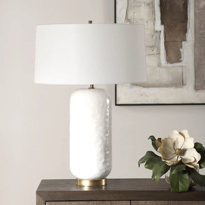 Iona Glaze Table Lamp by Uttermost in brass. Made from ceramic, metal, fabric in a transitional style.