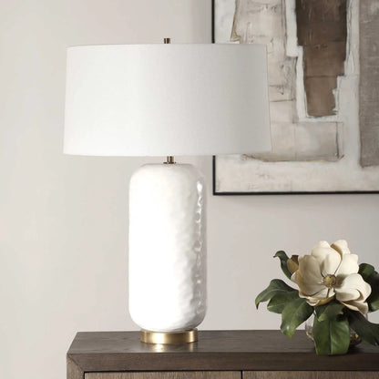 Iona Glaze Table Lamp by Uttermost in brass. Made from ceramic, metal, fabric in a transitional style.