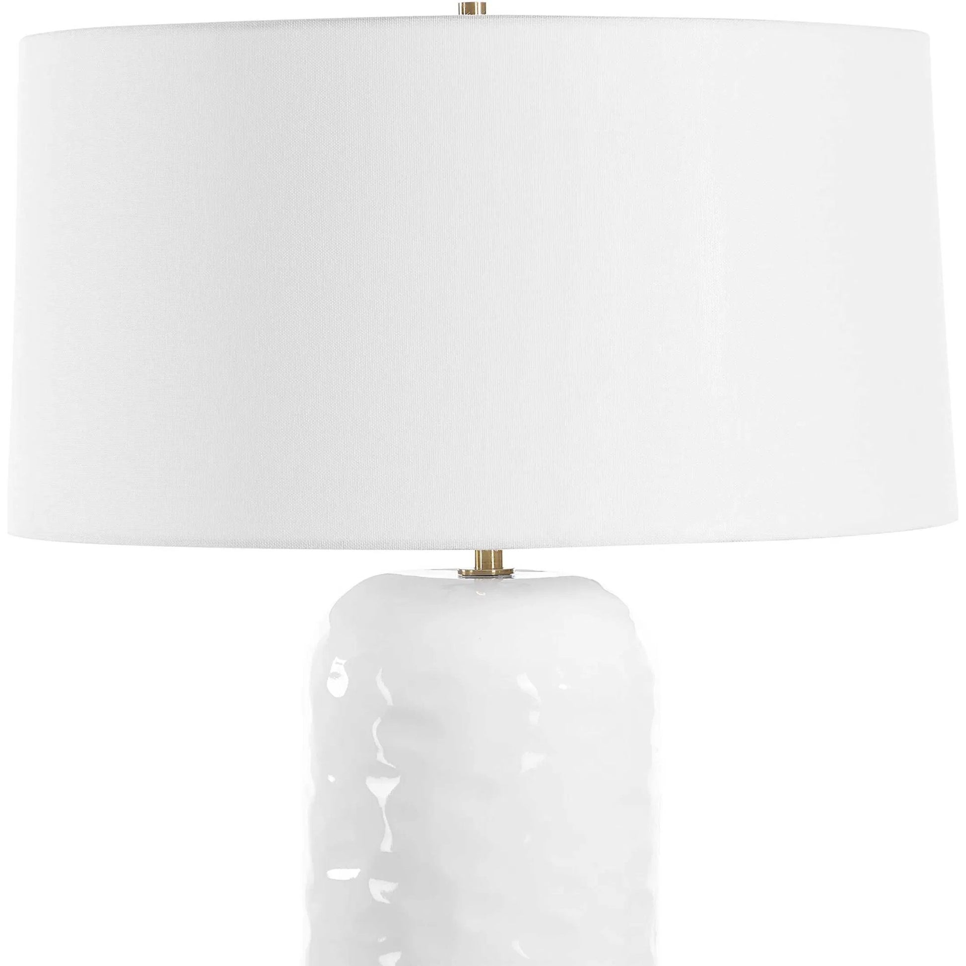 Iona Glaze Table Lamp by Uttermost in brass. Made from ceramic, metal, fabric in a transitional style.