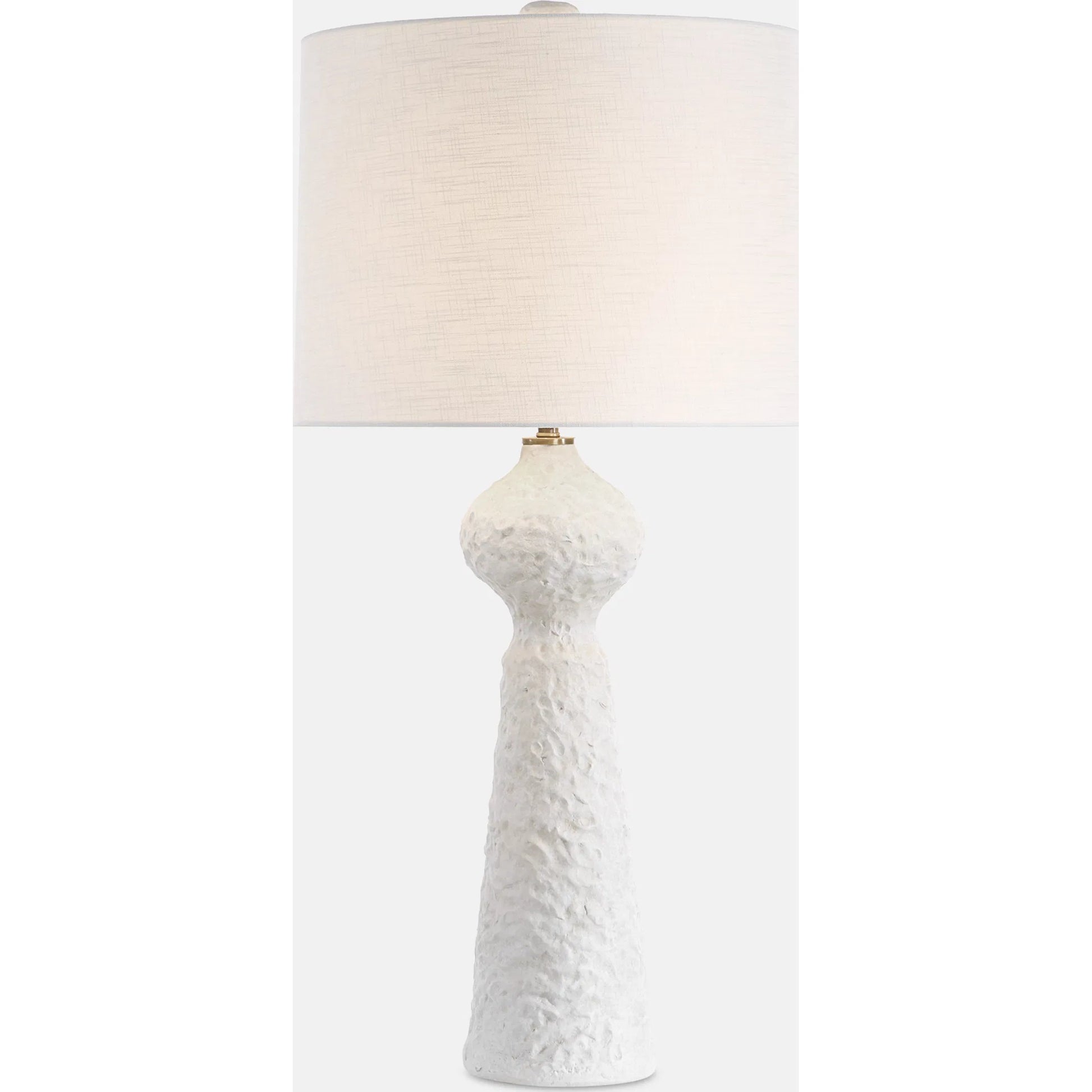 Sonata Textured Table Lamp by Uttermost in brass. Made from ceramic, steel, fabric in a transitional style.