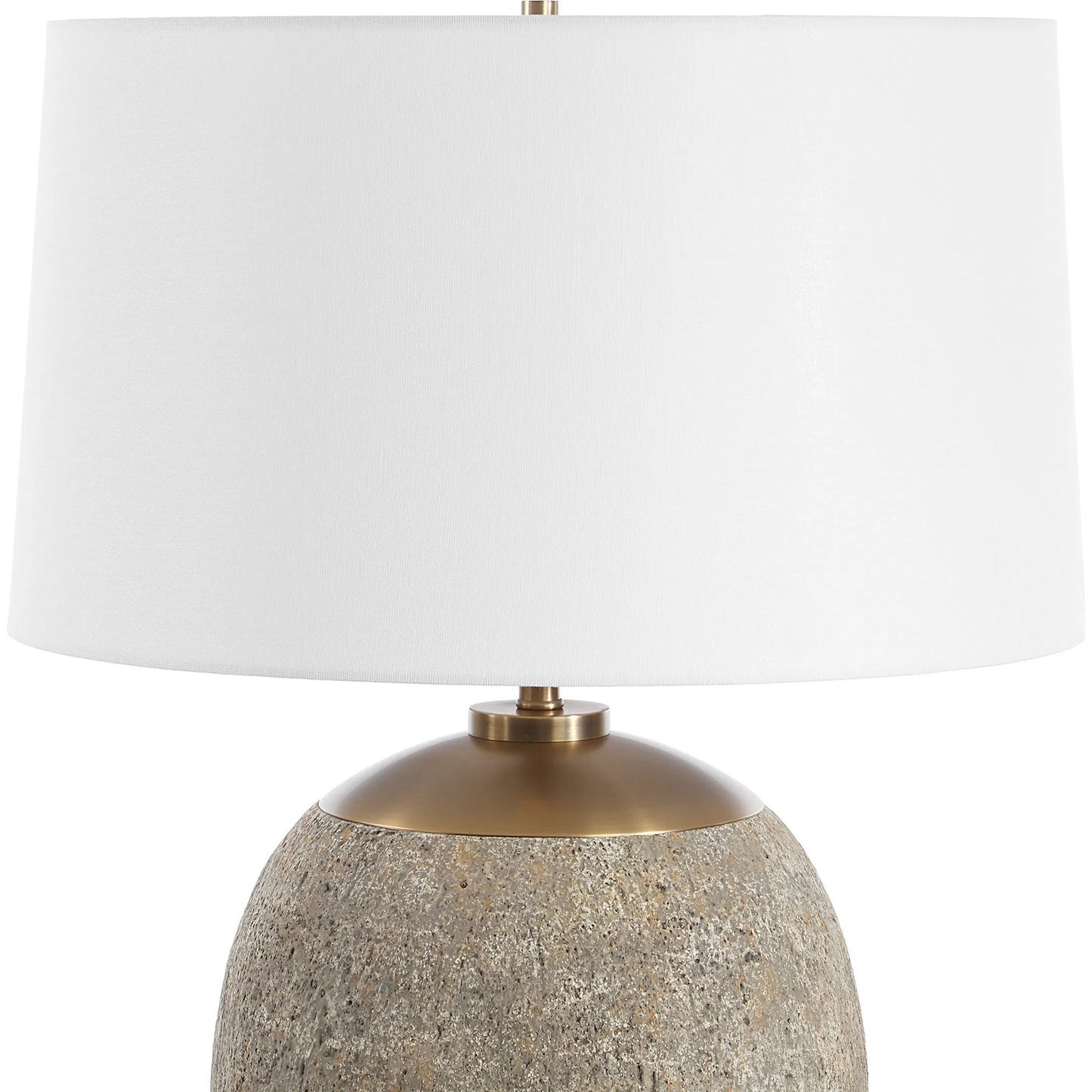 002 SI-2295282 | Closeup | Raylan Textured Table Lamp by Uttermost in brass. Made from metal, cement, fabric in a modern style.