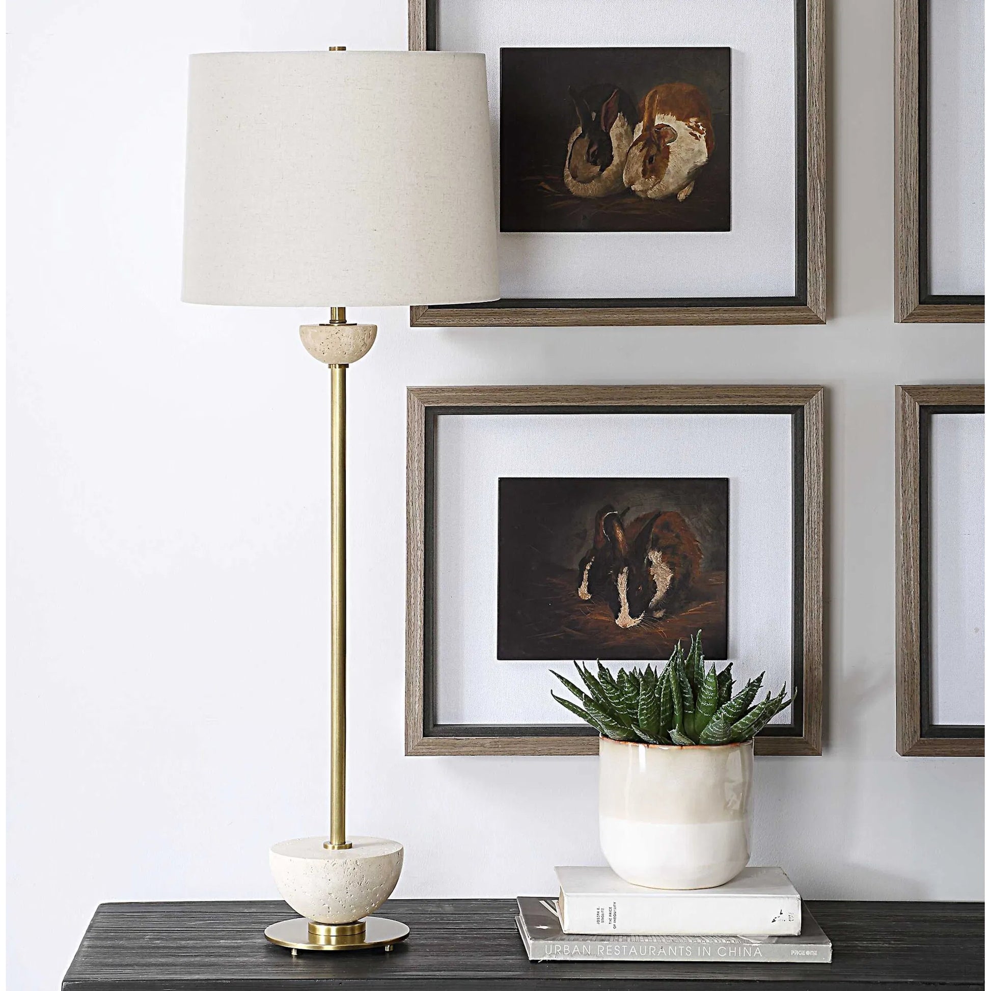 Hemisphere Buffet Lamp by Uttermost in brass. Made from travertine stone, metal, fabric in a transitional style.
