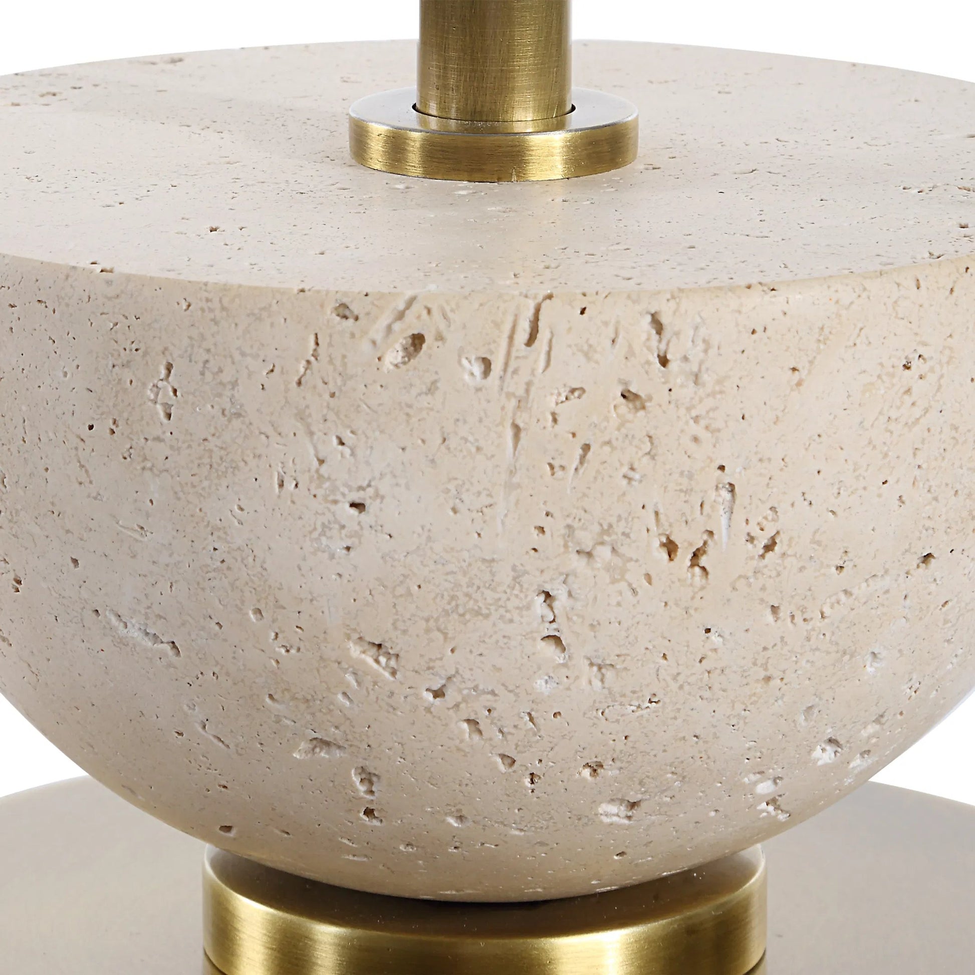 Hemisphere Buffet Lamp by Uttermost in brass. Made from travertine stone, metal, fabric in a transitional style.