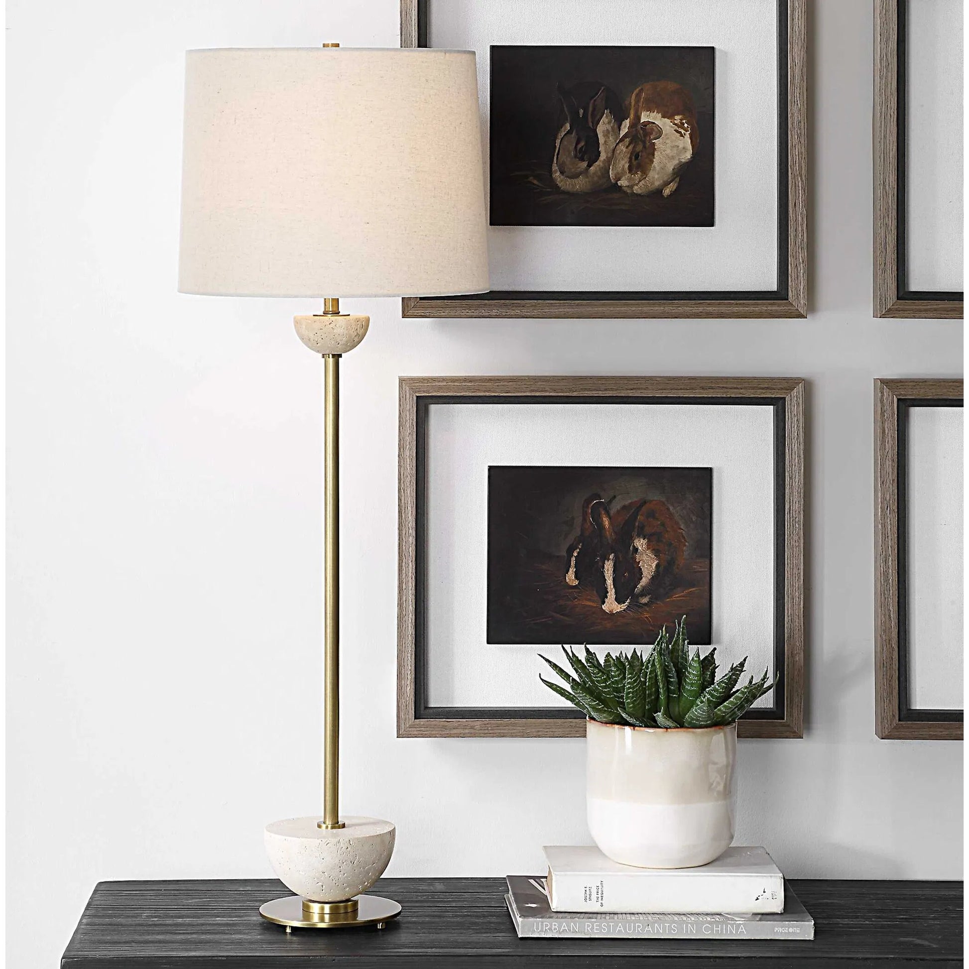 Hemisphere Buffet Lamp by Uttermost in brass. Made from travertine stone, metal, fabric in a transitional style.