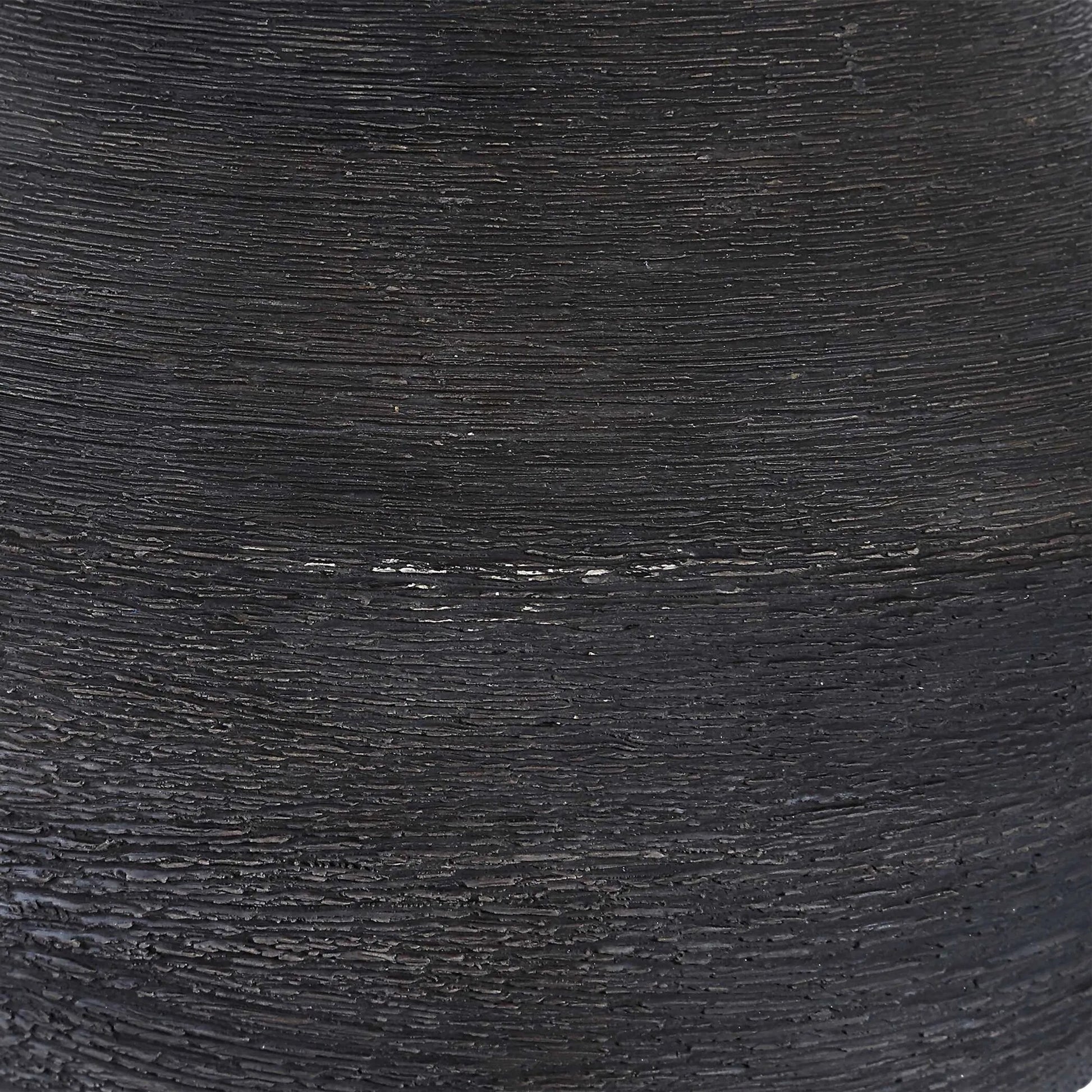 Helston Table Lamp by Uttermost in dark charcoal. Made from metal, ceramic, fabric in a modern style.