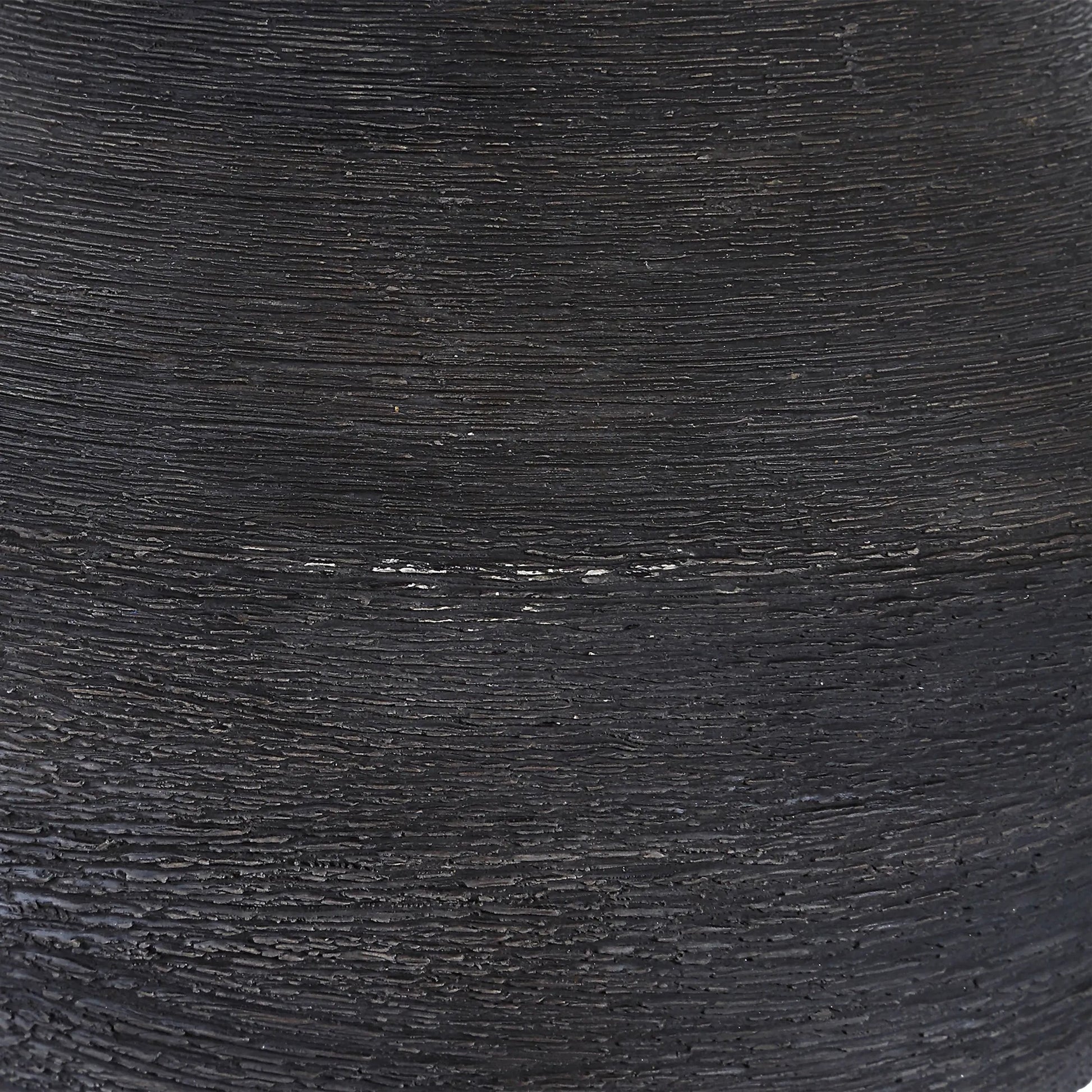 Helston Table Lamp by Uttermost in dark charcoal. Made from metal, ceramic, fabric in a modern style.