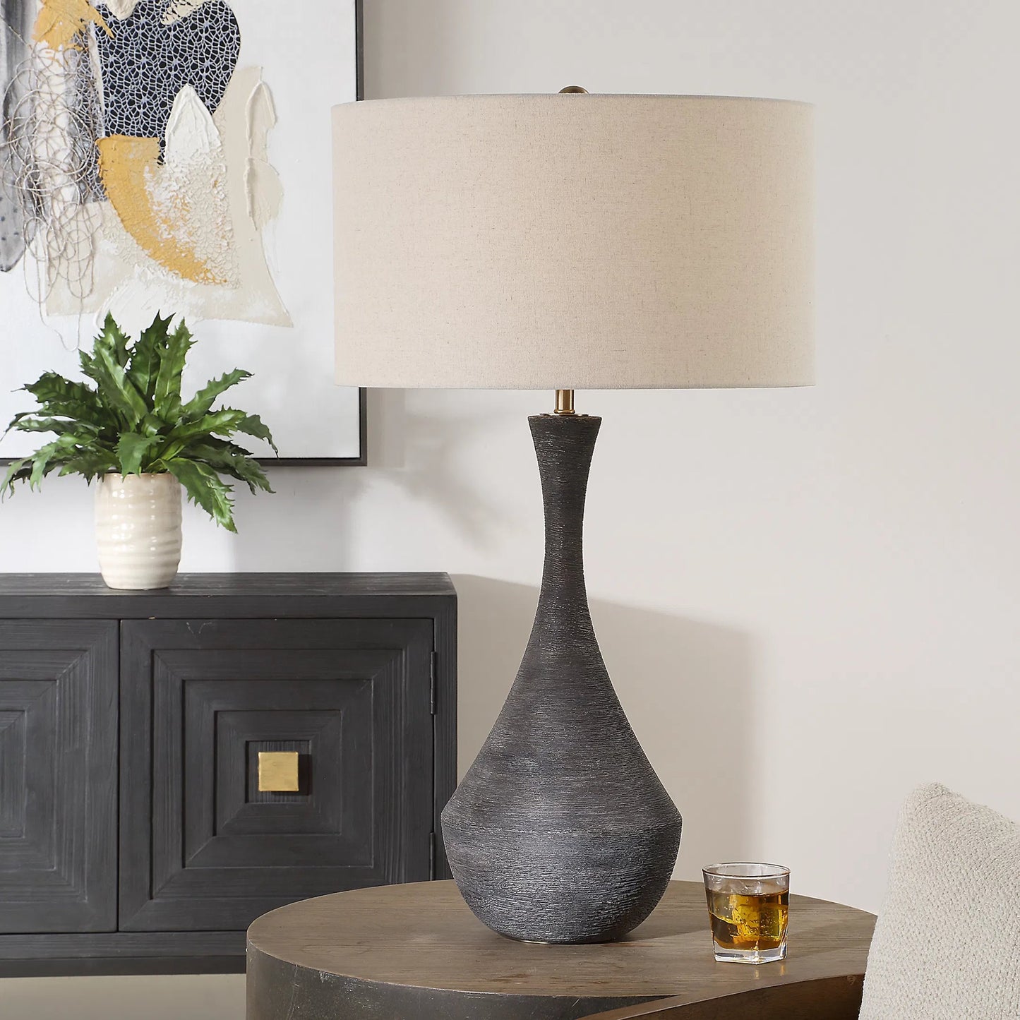 005 SI-2295299 | Lifestyle | Helston Table Lamp by Uttermost in dark charcoal. Made from metal, ceramic, fabric in a modern style.