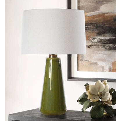 Kelley Moss Table Lamp by Uttermost in brass. Made from steel, ceramicfabric in a eclectic & global style.