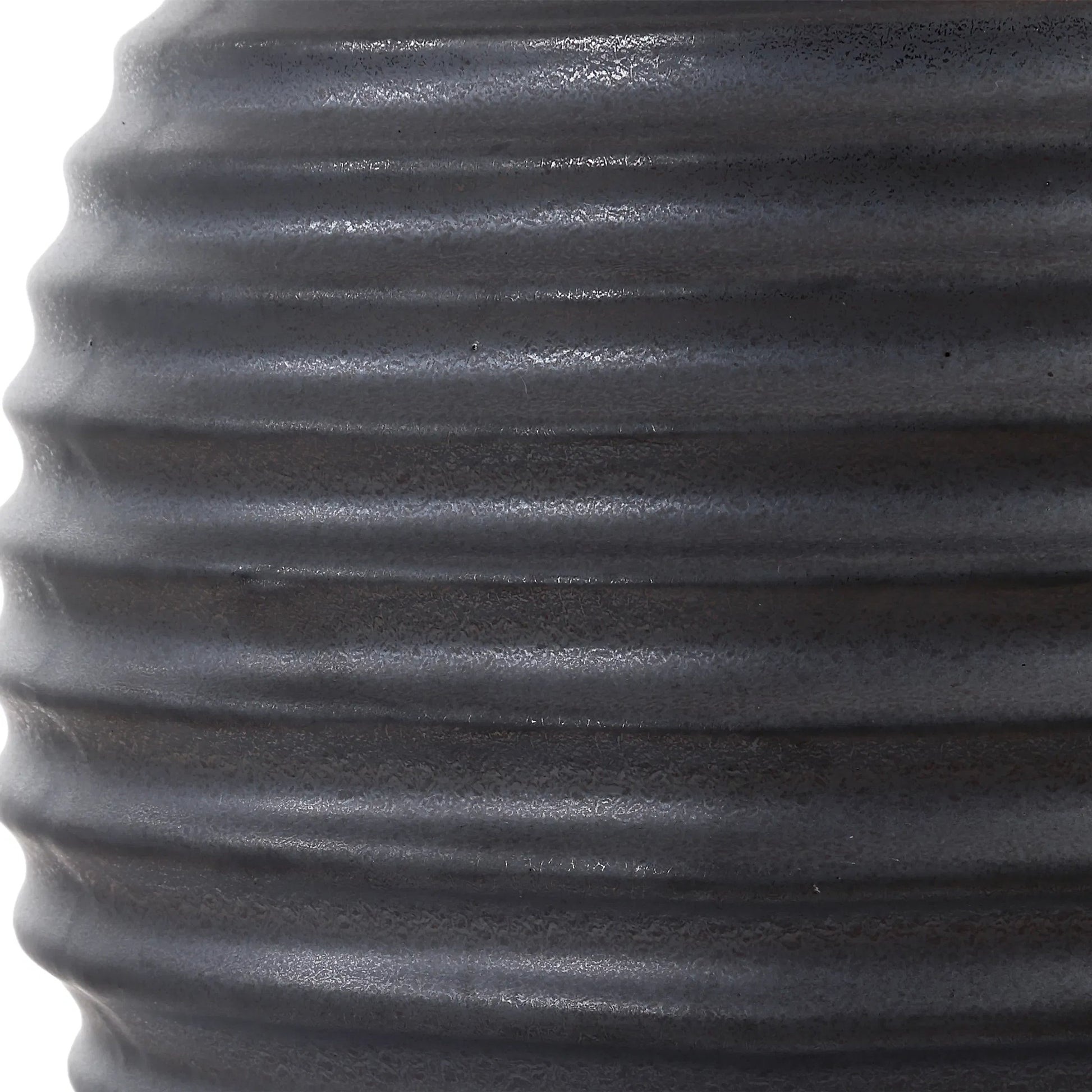 Chelsom Ribbed Table Lamp by Uttermost in dark bronze. Made from metal, ceramic, fabric in a modern style.