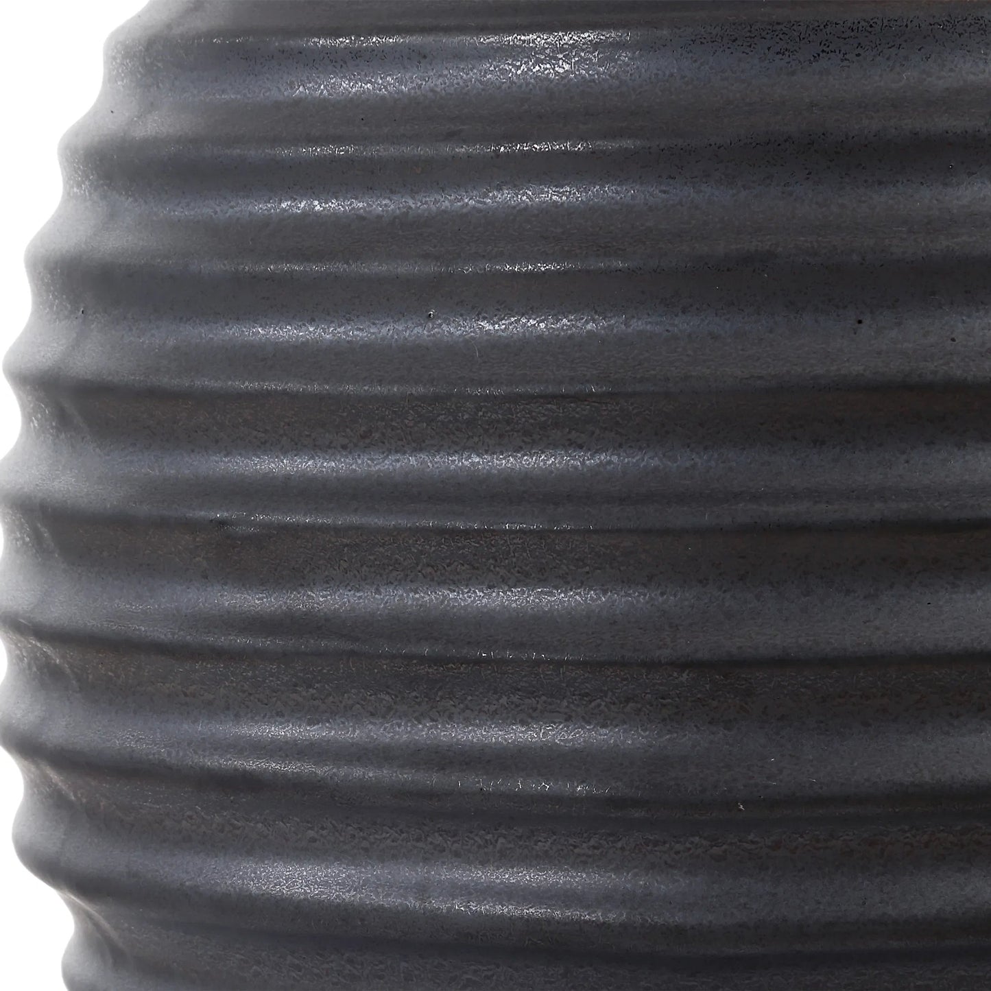 003 SI-2295264 | Closeup | Chelsom Ribbed Table Lamp by Uttermost in dark bronze. Made from metal, ceramic, fabric in a modern style.