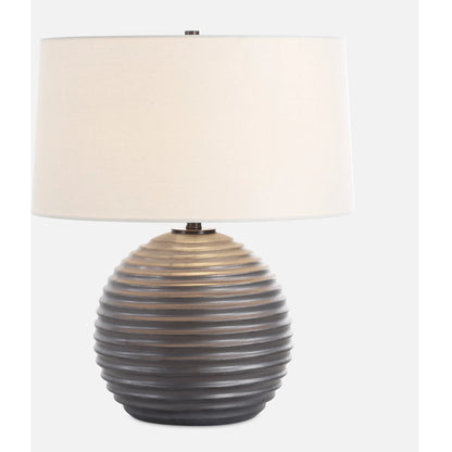 Chelsom Ribbed Table Lamp by Uttermost in dark bronze. Made from metal, ceramic, fabric in a modern style.
