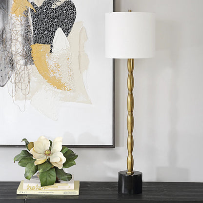 Ezra Buffet Lamp by Uttermost in brass. Made from metal, marble, fabric in a modern style.
