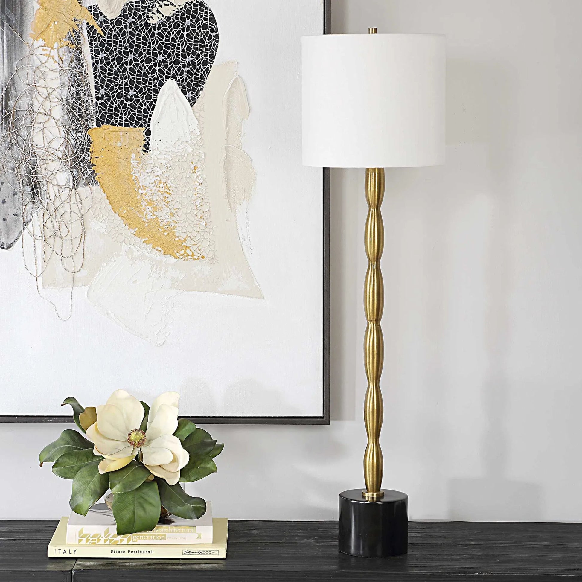 Ezra Buffet Lamp by Uttermost in brass. Made from metal, marble, fabric in a modern style.