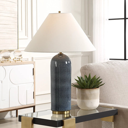 Mayetta Table Lamp by Uttermost in deep blue and brass. Made from steel, ceramic, fabric in a unique style.