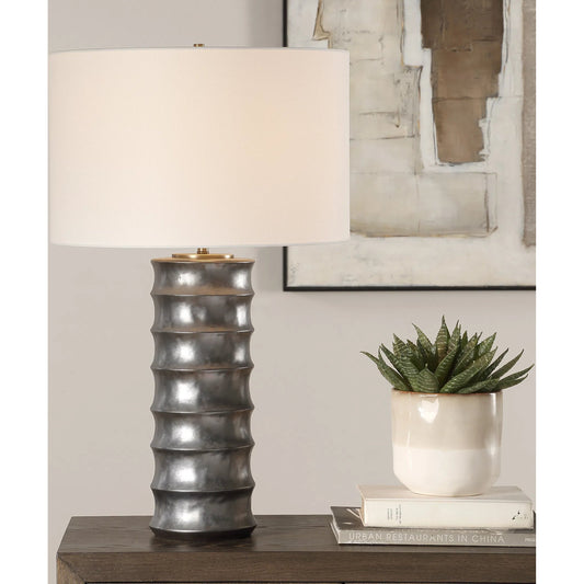 Corvair Scalloped Table Lamp by Uttermost in dark bronze. Made from porcelain, fabric, steel in a unique style.