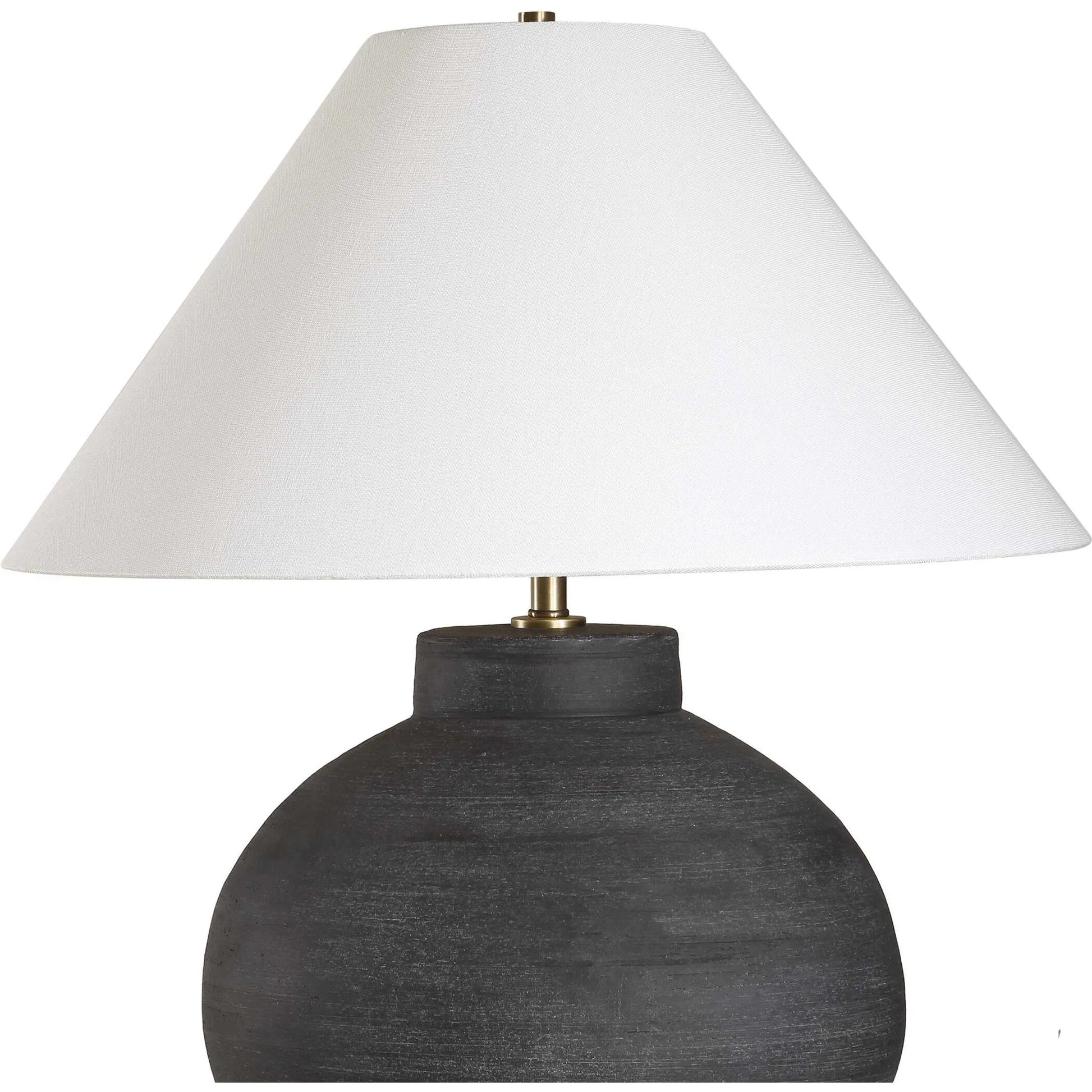 Tramore Rustic Table Lamp by Uttermost in brass. Made from porcelain, fabric, steel in a modern style.