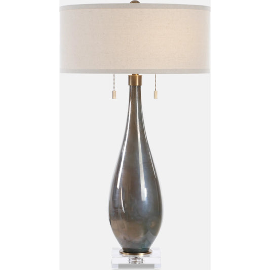 Cardoni Smoke Table Lamp by Uttermost in bronze. Made from metal, glass, crystal, linen in a modern style.