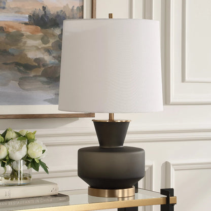 Trentino Table Lamp by Uttermost. Made from metal, glass, linen in a modern style.