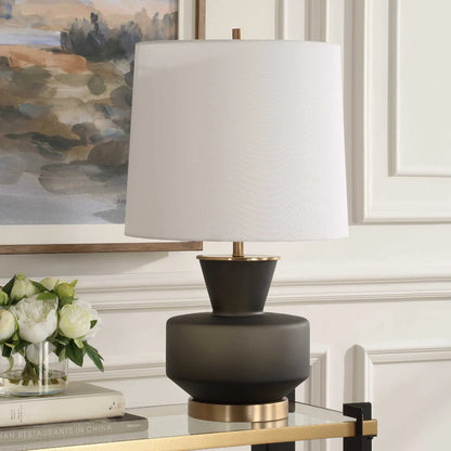 Trentino Table Lamp by Uttermost. Made from metal, glass, linen in a modern style.