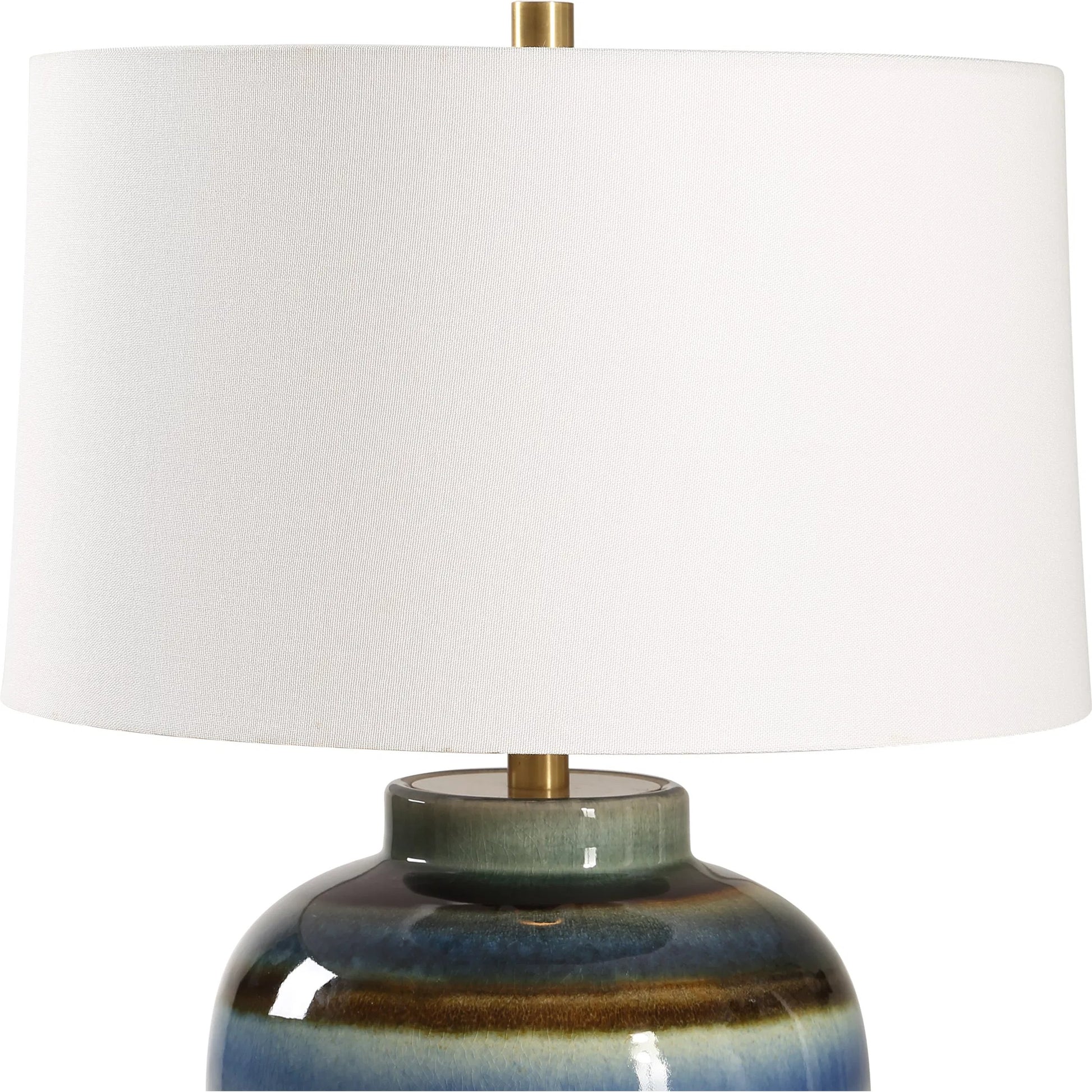 Judarn Table Lamp by Uttermost in brass. Made from ceramic, iron, fabric in a eclectic & global style.