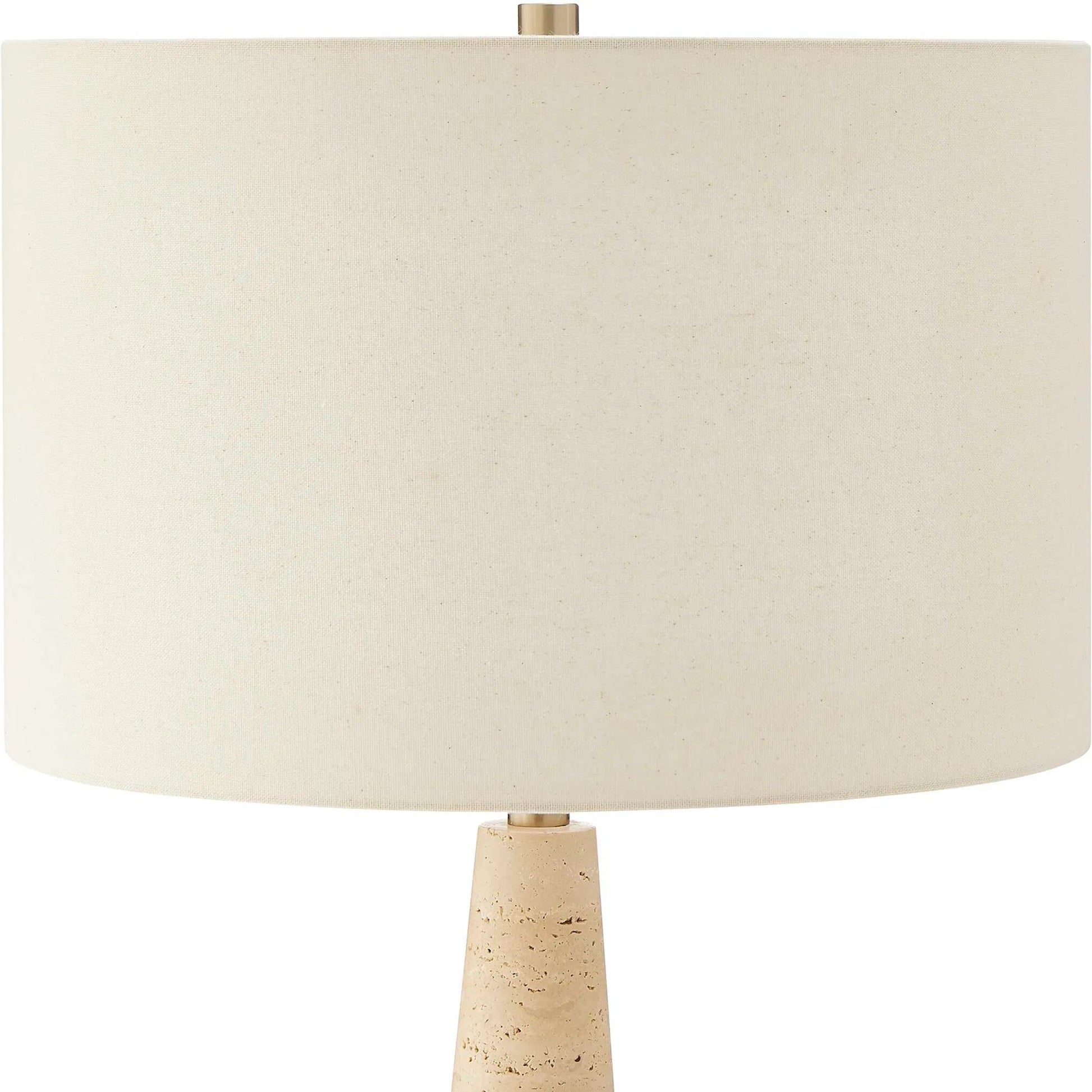 Perkins Travertine Table Lamp by Uttermost in brown and brass. Made from travertine, iron, fabric in a transitional style.