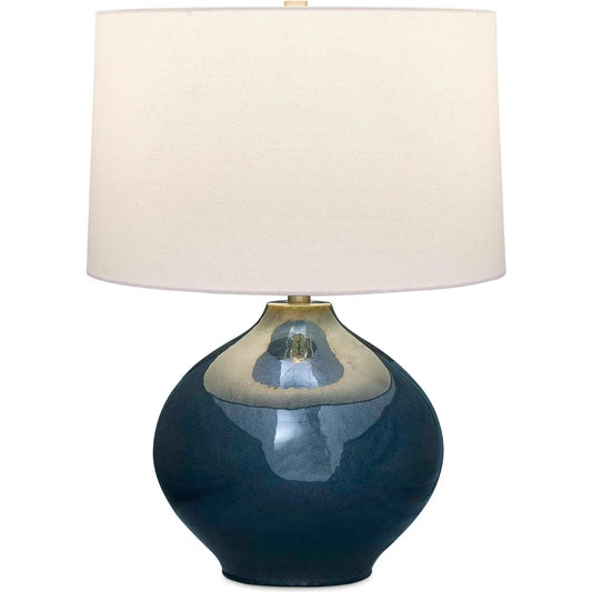 Corrine Table Lamp by Uttermost in blue and brass. Made from ceramic, fabric, iron in a unique style.