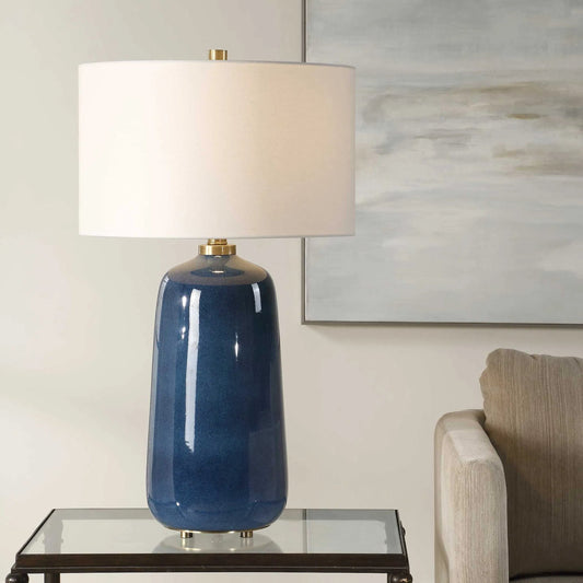 Brae Glaze Table Lamp by Uttermost in blue. Made from ceramic, metal, fabric in a unique style.