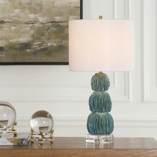 Bonaire Table Lamp by Uttermost in teal blue. Made from ceramic, crystal, iron, fabric in a unique style.