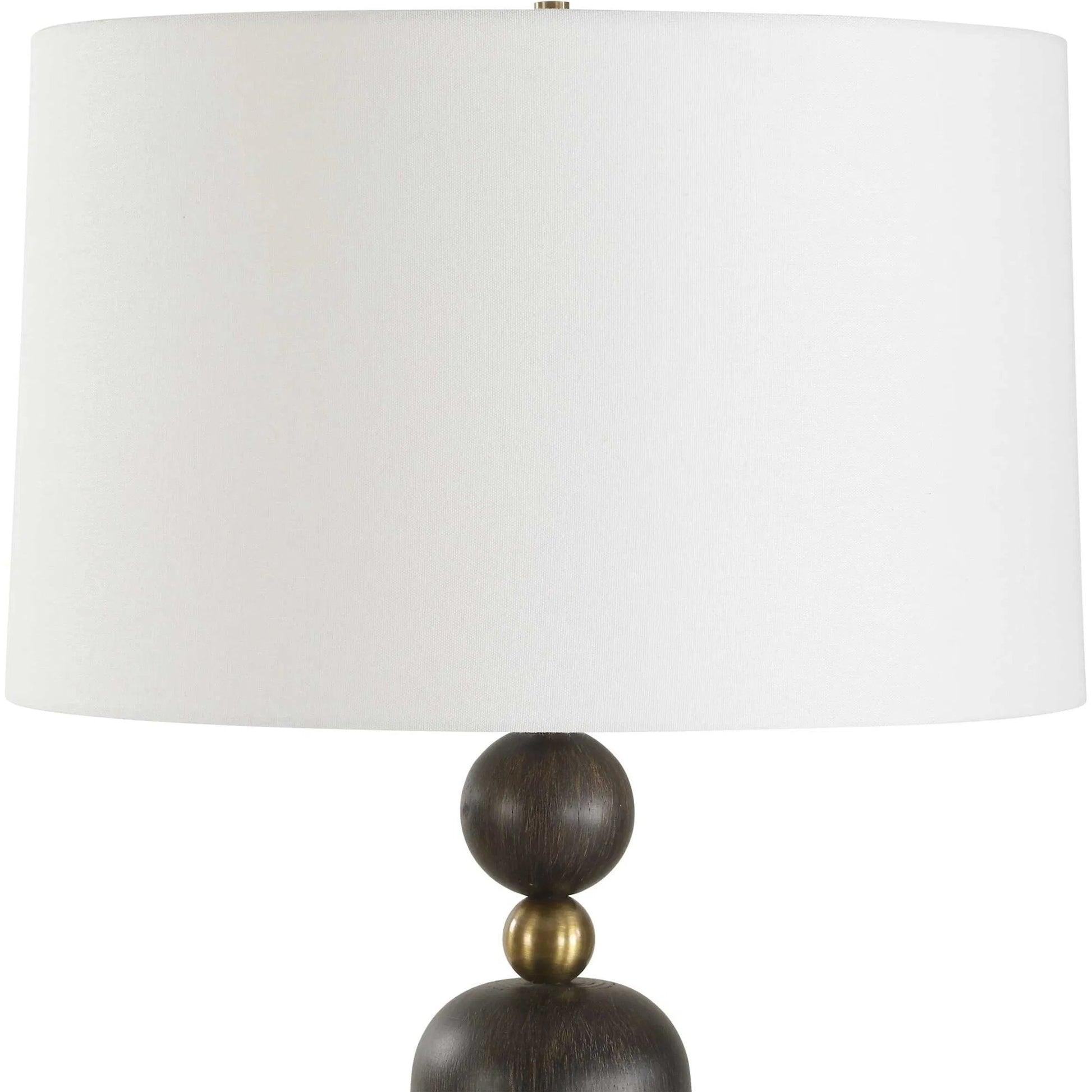 McQuinn Table Lamp by Uttermost in dark walnut. Made from metal, wood, %fabric in a traditional style.