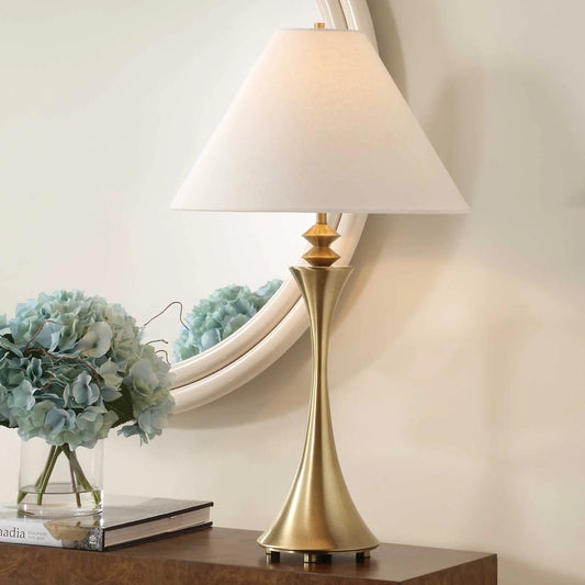 Shaefer Table Lamp by Uttermost in gold. Made from metal, fabric in a unique style.