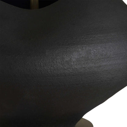 Nocturne Table Lamp by Uttermost in black and brass. Made from porcelain, fabric, steel in a modern style.