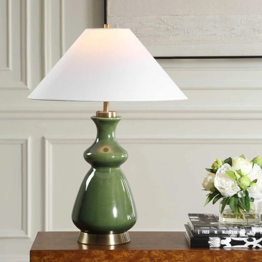 Green Thumb Table Lamp by Uttermost in green and brass. Made from metal, ceramic, fabric in a unique style.