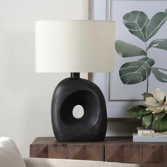 Peephole Outdoor Table Lamp by Uttermost in dark bronze. Made from concrete, steel, fabric in a unique style.