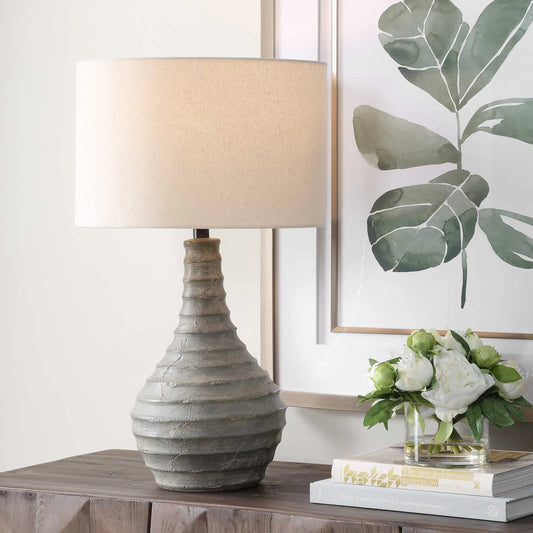 Stratum Rustic Outdoor Table Lamp by Uttermost in gray, dark bronze. Made from concrete, steel, fabric in a unique style.