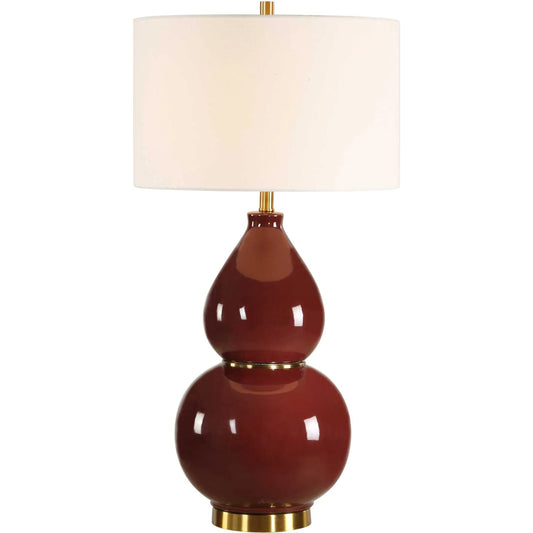 Gourd Burgundy Table Lamp by Uttermost in red and brass. Made from metal, ceramic, fabric in a unique style.