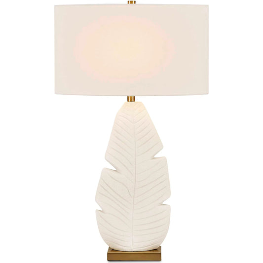 Palm Leaf Table Lamp by Uttermost in white and brass. Made from ceramic, fabric, galvanized steel in a unique style.