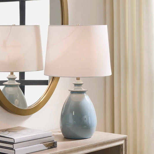 Lorene Light Table Lamp by Uttermost in blue and nickel. Made from ceramic, fabric, galvanized steel in a unique style.