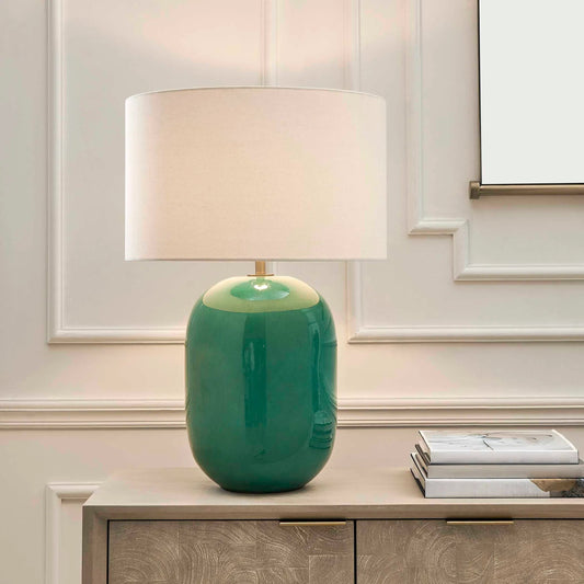 Hollis Table Lamp by Uttermost in green and gold. Made from ceramic, fabric, galvanized steel in a unique style.