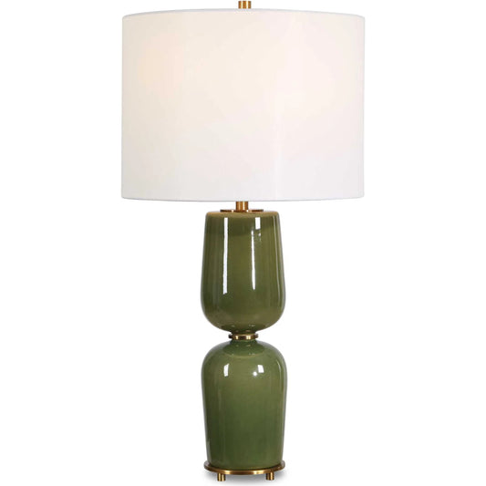 Meyer Table Lamp by Uttermost in green and brass. Made from ceramic, iron, fabric in a unique style.