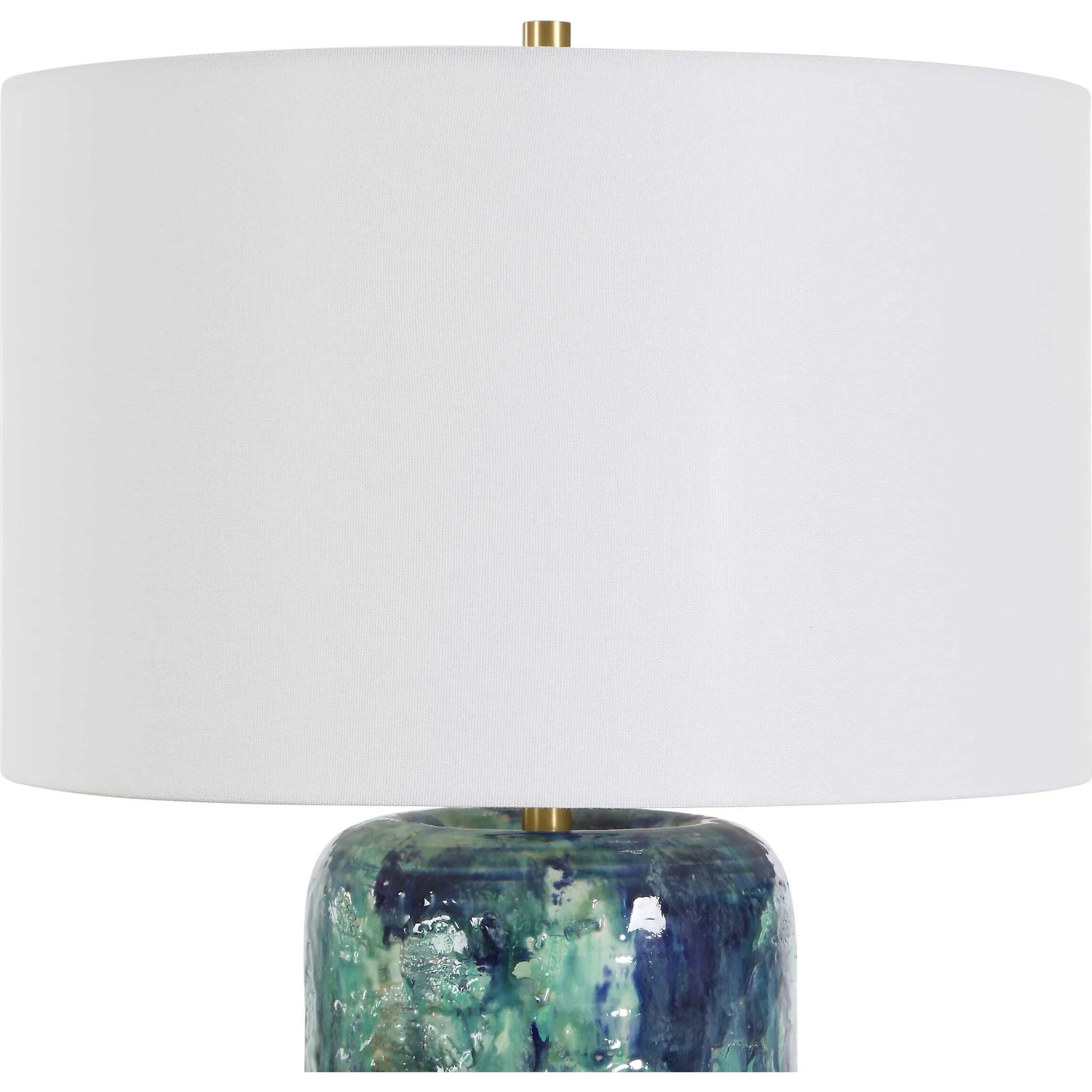 Out of the Blue Table Lamp by Uttermost in blue, green and brass. Made from ceramic, iron, fabric in a unique style.
