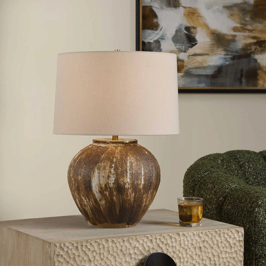 McKinley Textured Table Lamp by Uttermost in brown. Made from iron, cramic, fabric in a unique style.