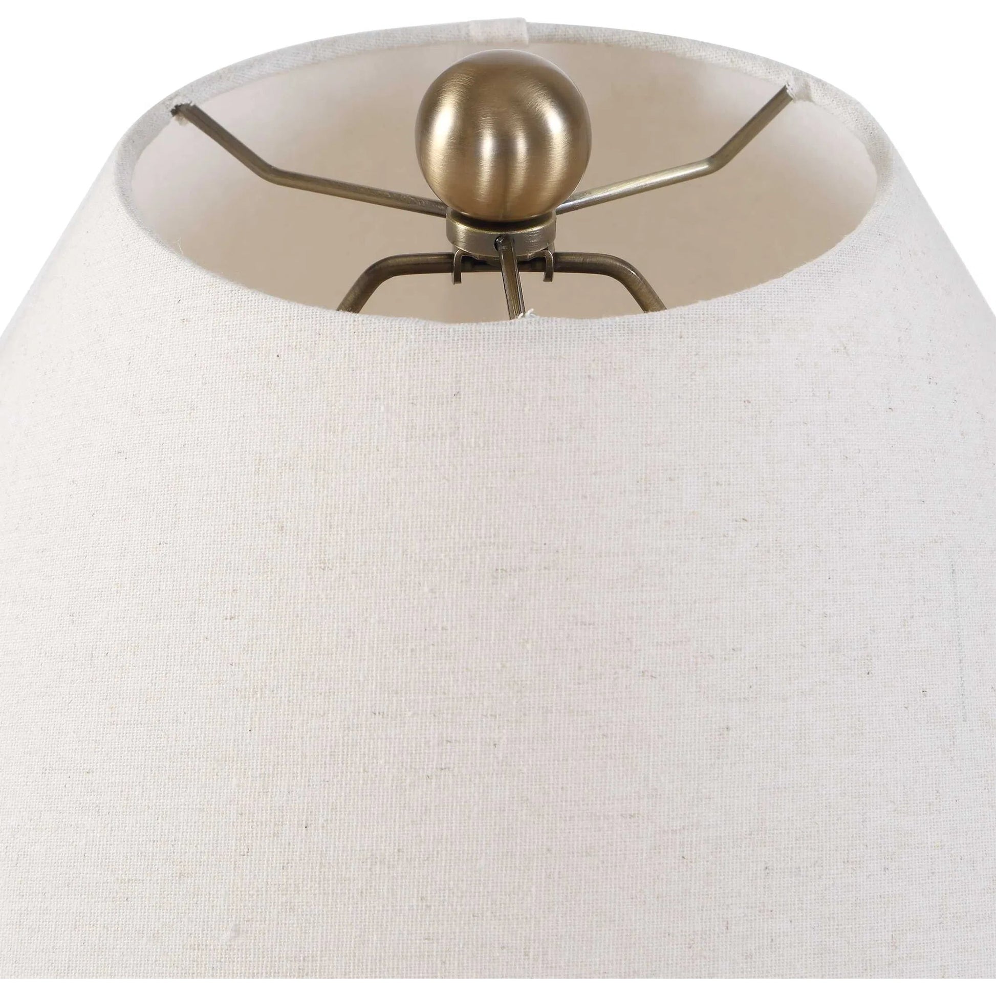 Brinsley Table Lamp by Uttermost in white and brass. Made from metal, ceramic, fabric in a unique style.