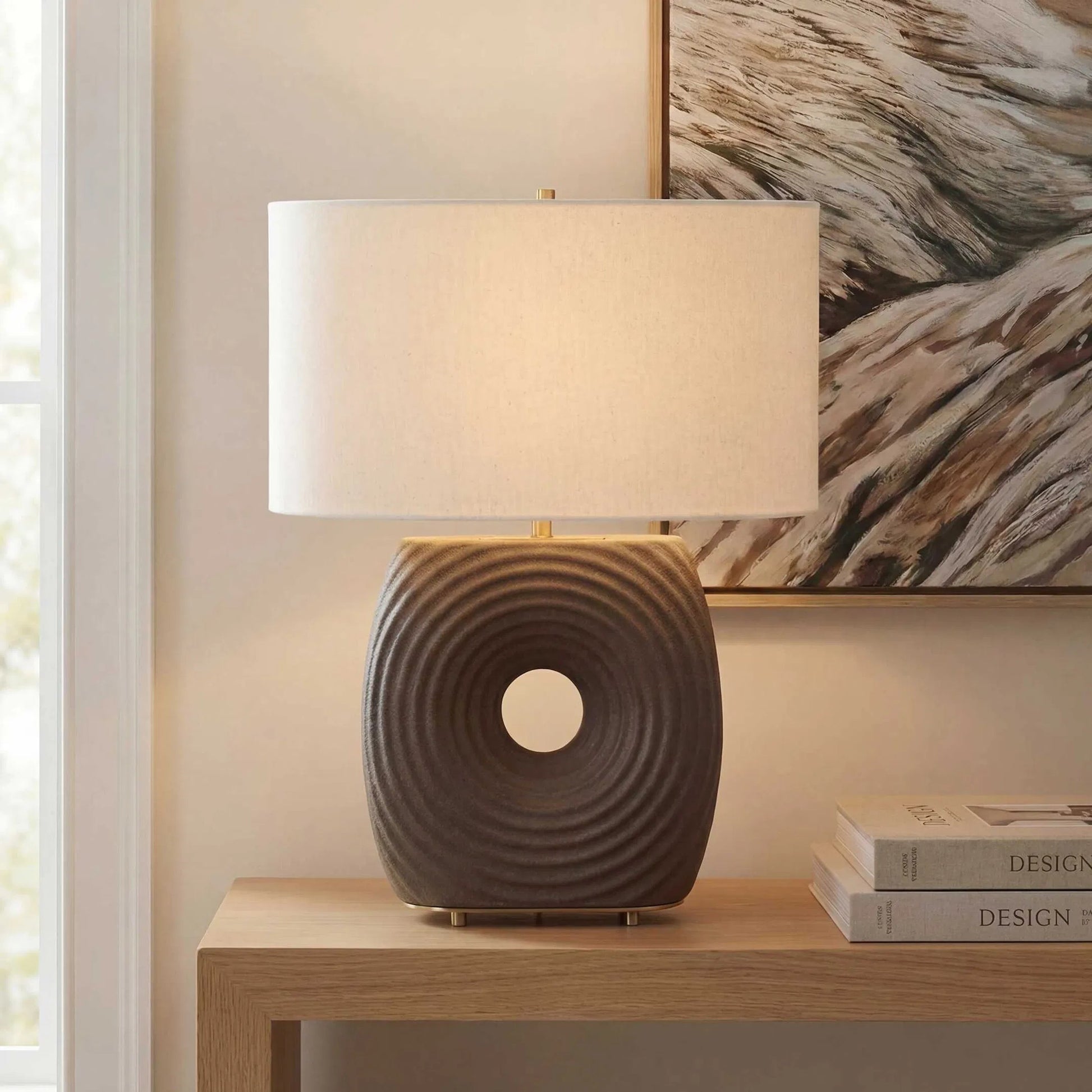 Geno Concentric Ribbed Table Lamp by Uttermost in brown and brass. Made from ceramic, iron, fabric in a unique style.