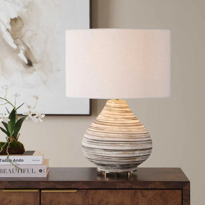 Azura Horizontal Line Table Lamp by Uttermost in brown, gray, white and dark. Made from ceramic, iron, fabric in a unique style.