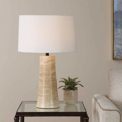 Delmani Indoor/Outdoor Lamp by Uttermost in dark. Made from travertine, iron, fabric in a unique style.