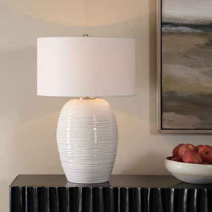 Alkman Glaze Table Lamp by Uttermost in white and nickel. Made from steel, ceramic, fabric in a unique style.