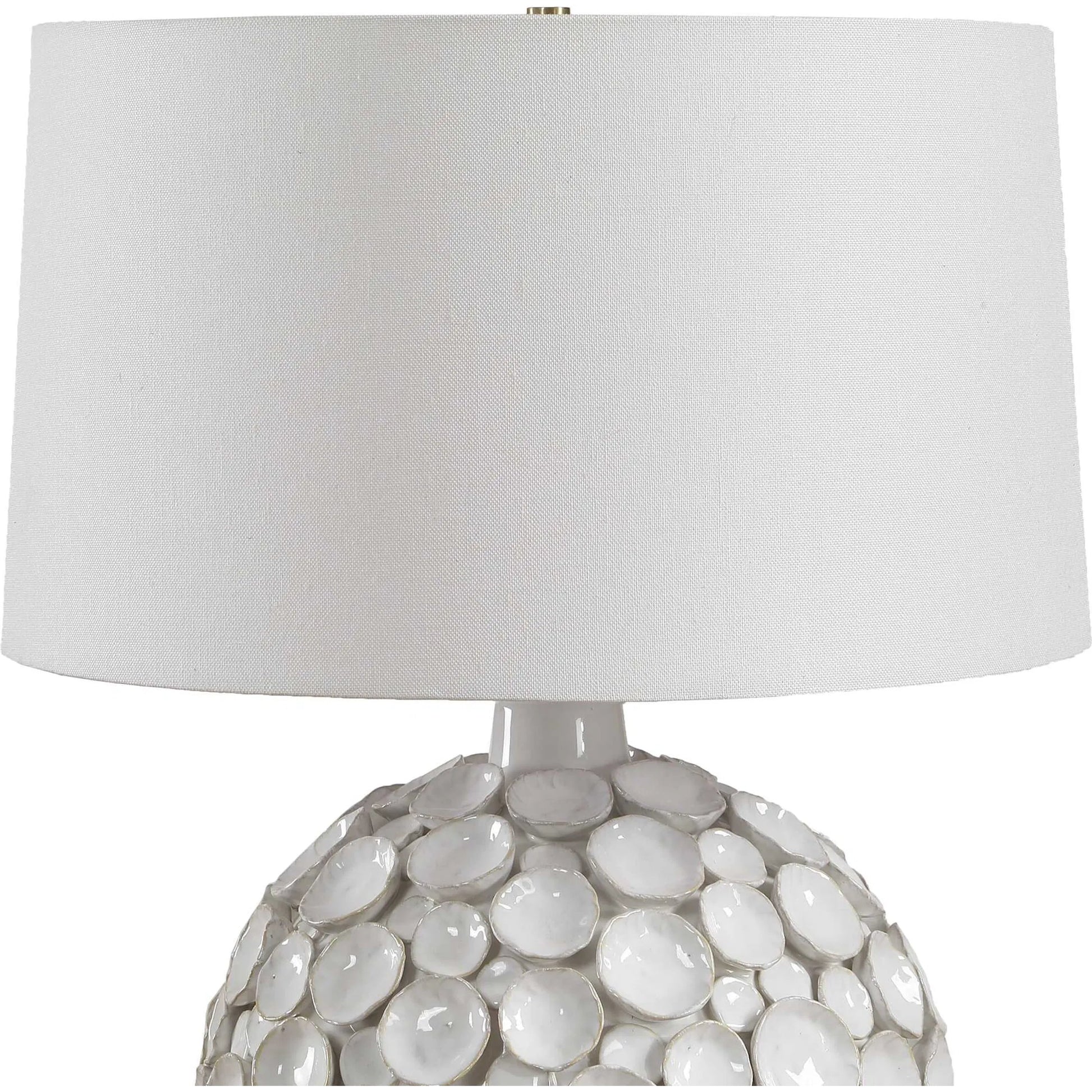 Hartley Petal Table Lamp by Uttermost in white and brass. Made from steel, ceramic, fabric in a unique style.